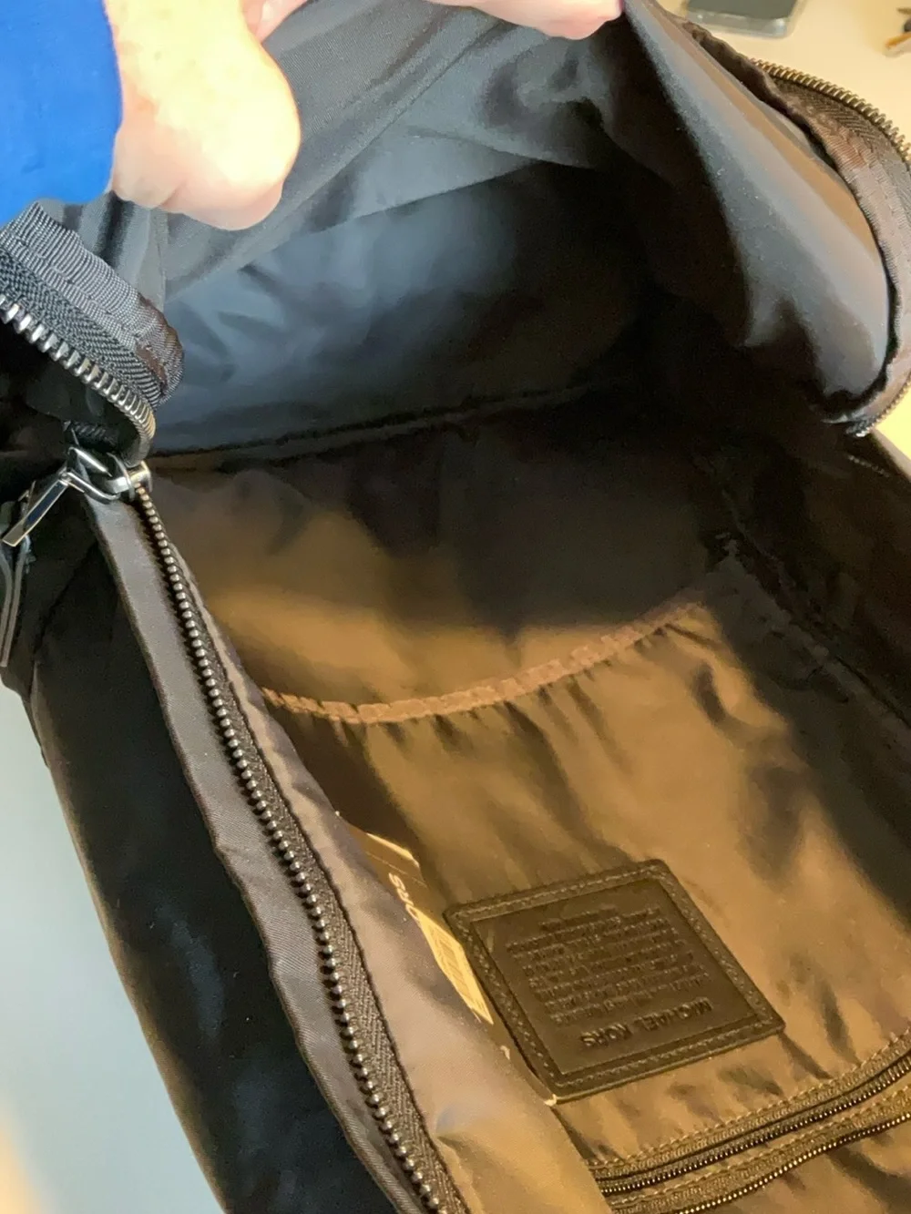 Black Michael Kors Kent Backpack. Silver hardware
